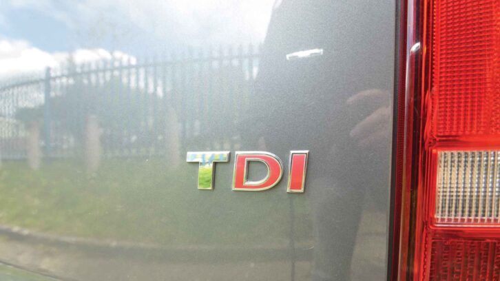 The TDI badge with the 'DI' in red