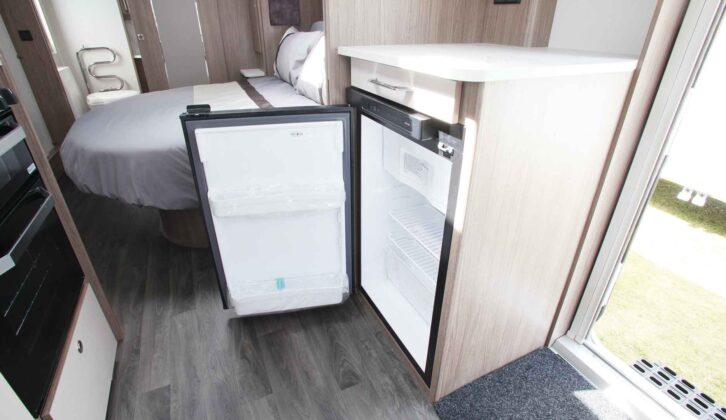 An under counter fridge with its door open