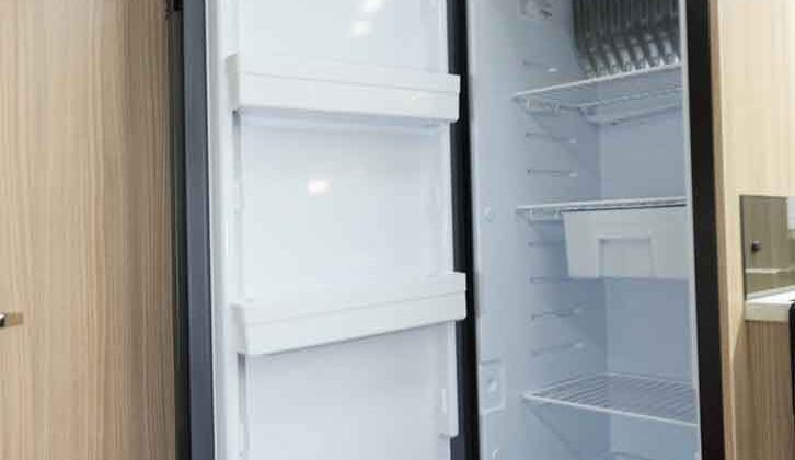 A fridge with its door open to let air circulate