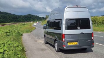 A VW Grand California pulled over on the side of the road