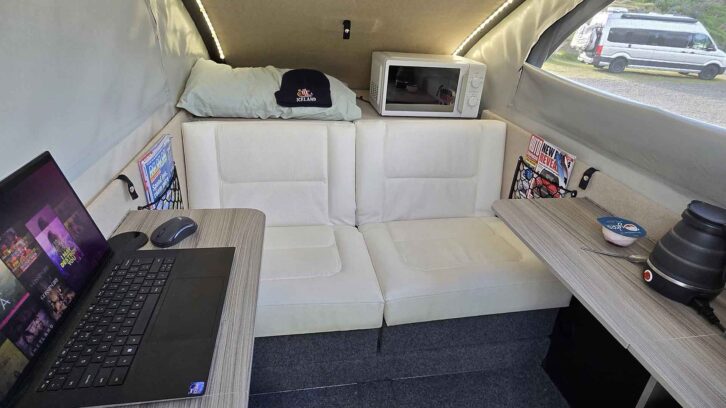 The microwave and seating in the Tesla