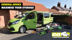 A campervan with its contents being sorted out