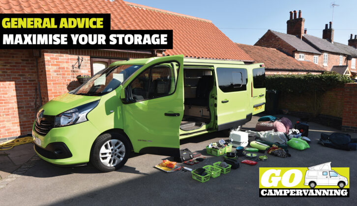 A campervan with its contents being sorted out