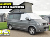 A campervan with its pop-top roof up