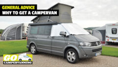 A campervan with its pop-top roof up