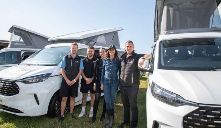 The Marquis team and Julia Bradbury standing in front of two Panama campervans