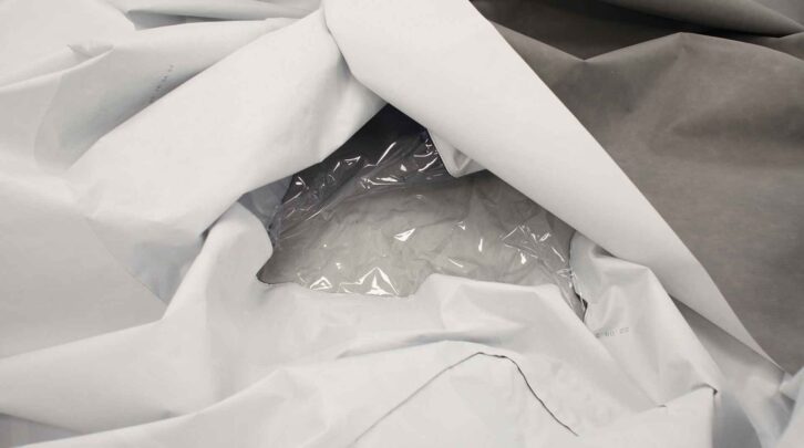 A cover with a transparent window for the panel