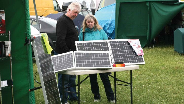 A couple looking at solar panels