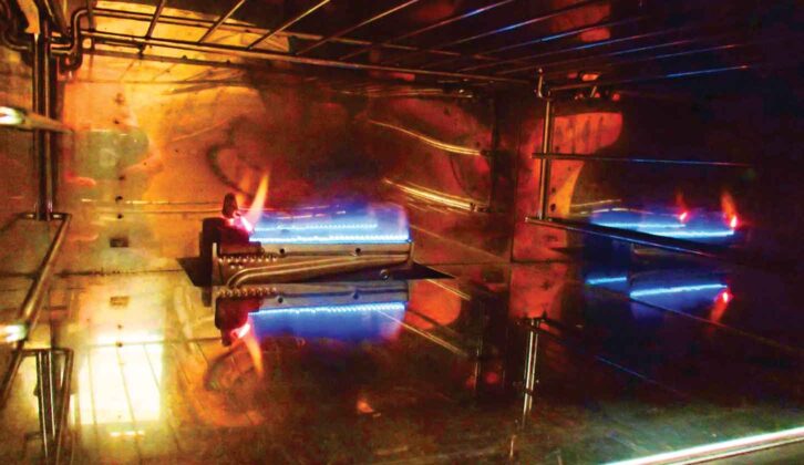 A correctly functioning LPG burner with a clean blue flame