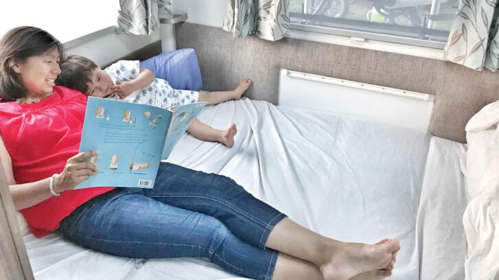 Reading a book to a child