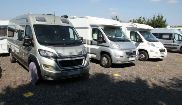 Motorhomes lined up in storage