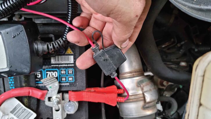 A battery charger wit alligator clips