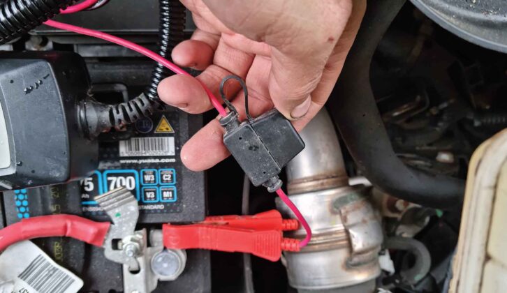 A battery charger wit alligator clips