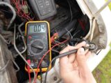A multimeter showing a reading of 0.04A