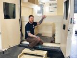 John inside a van in the process of being converted