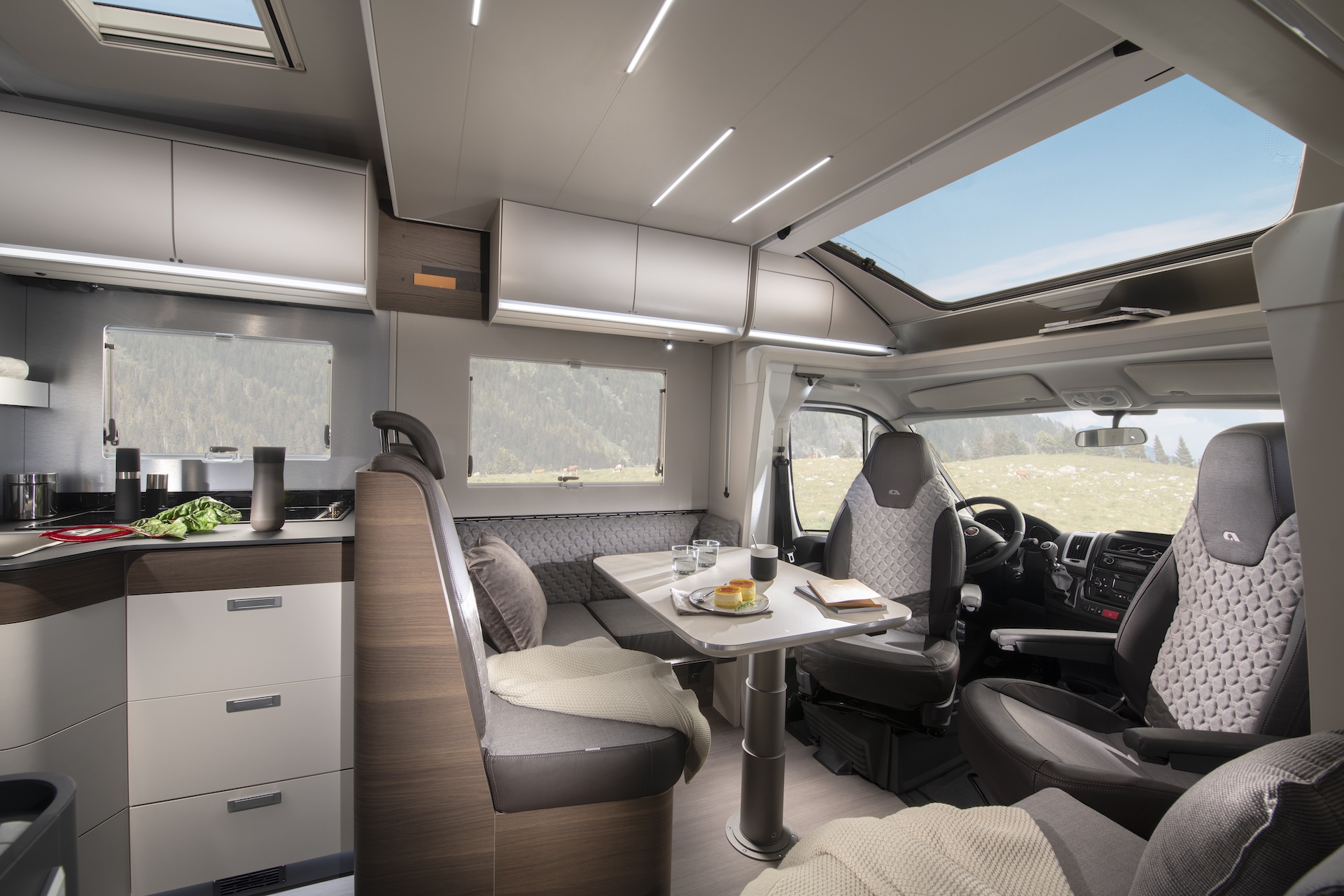 Image of the interior of the 2026 Adria Matrix Supreme 670, looking towards the lounge