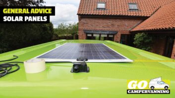 A campervan with a solar panel on its roof