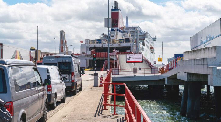 Vans boarding a ferry