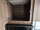 One of the kitchen cupboards