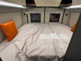 The rear bed with an orange "Noto" cushion