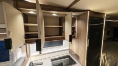 Empty kitchen cupboards in a motorhome