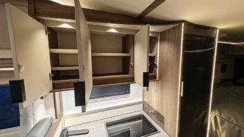 Empty kitchen cupboards in a motorhome