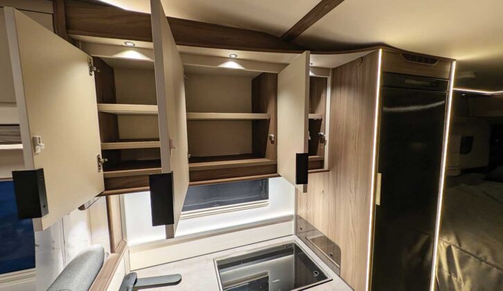 Empty kitchen cupboards in a motorhome