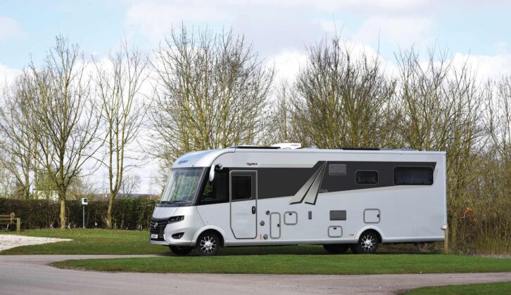 An A-class motorhome at a quiet campsite