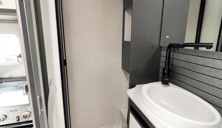 The shower cubicle and washbasin