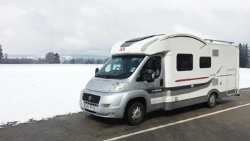 An Adria motorhome with snow