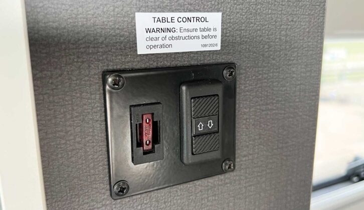 The switch for raising and lowering the table