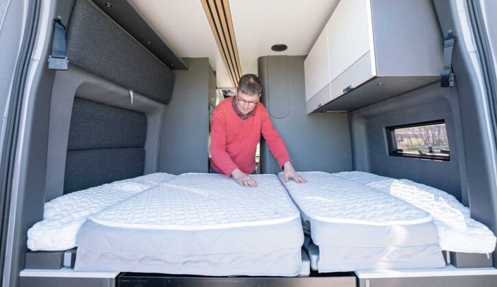 Making up a bed in a campervan