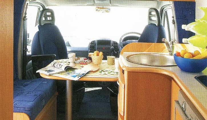 The storage above the cab in a 2004 McLouis