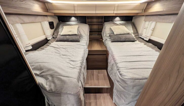 Both twin beds raised for reading