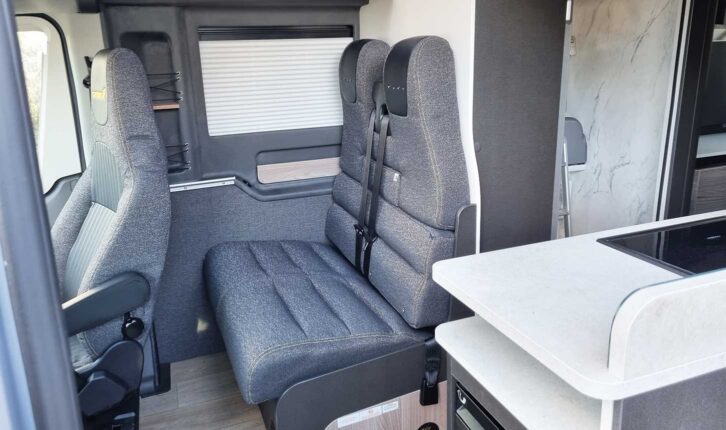 Travel seats with a contoured shape