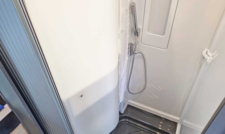 The slide-out shower screen