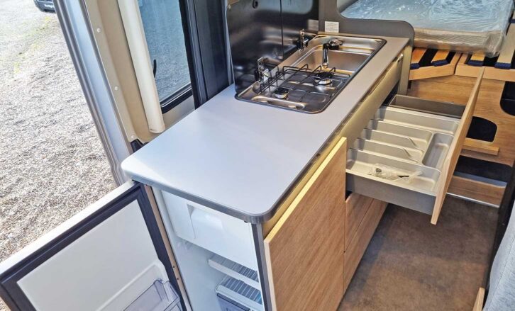 The fridge on the kitchen unit