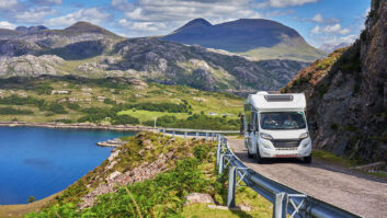 A motorhome driving along the NC500