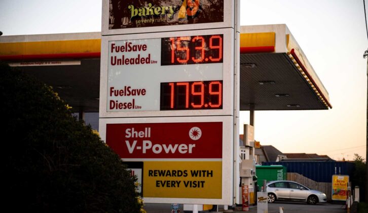 A petrol station displaying prices for unleaded and diesel