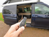 Pointing a keyfob at a campervan