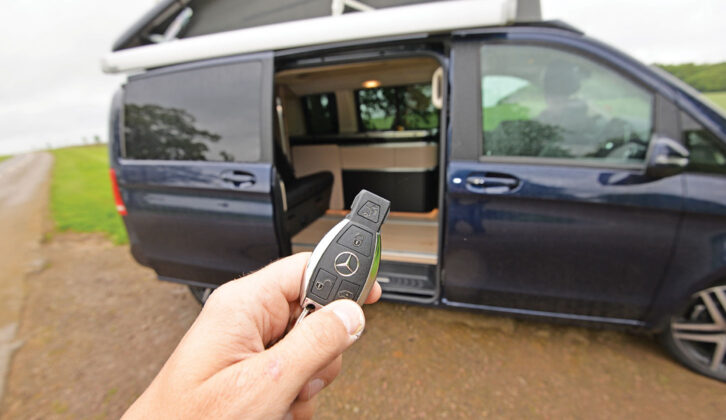 Pointing a keyfob at a campervan