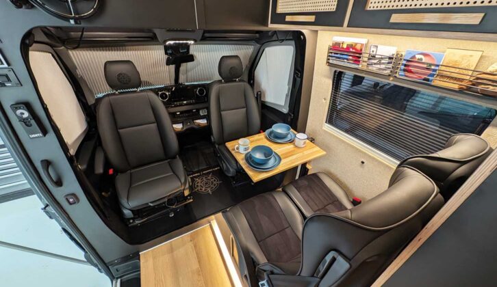 The front lounge includes a clip-on table