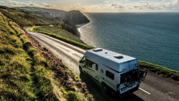 A campervan driving along the Atlantic Highway