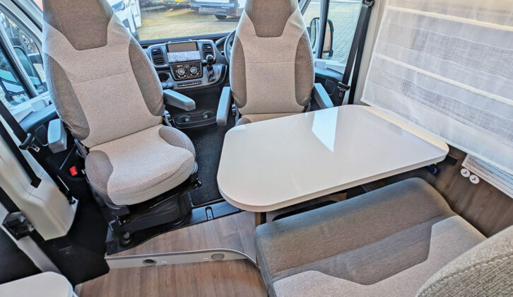 The clip-on table in the front lounge