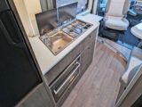 The kitchen with two-burner hob above an oven and grill