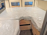 The single beds at the rear
