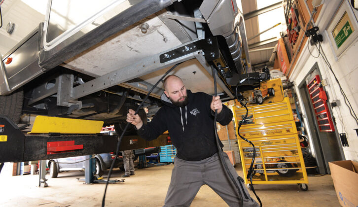 A towbar being fitted by a specialist