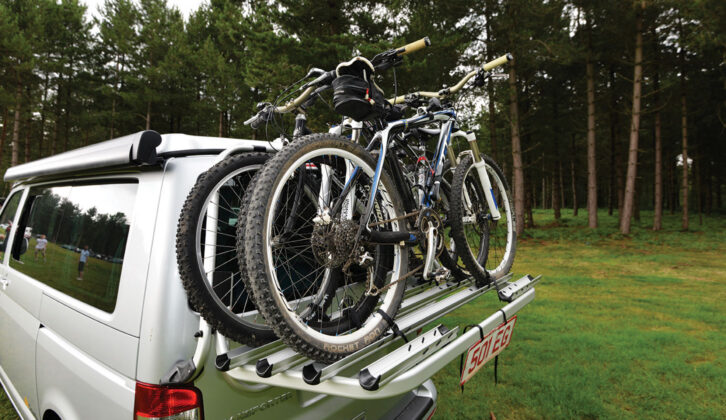 A factory fitted bike rack on a VW Transporter with two bikes on it