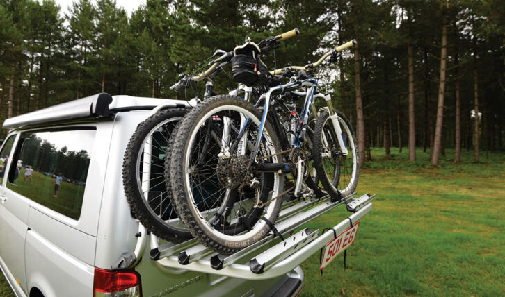 A factory fitted bike rack on a VW Transporter with two bikes on it