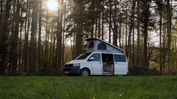 A campervan in a forest setting